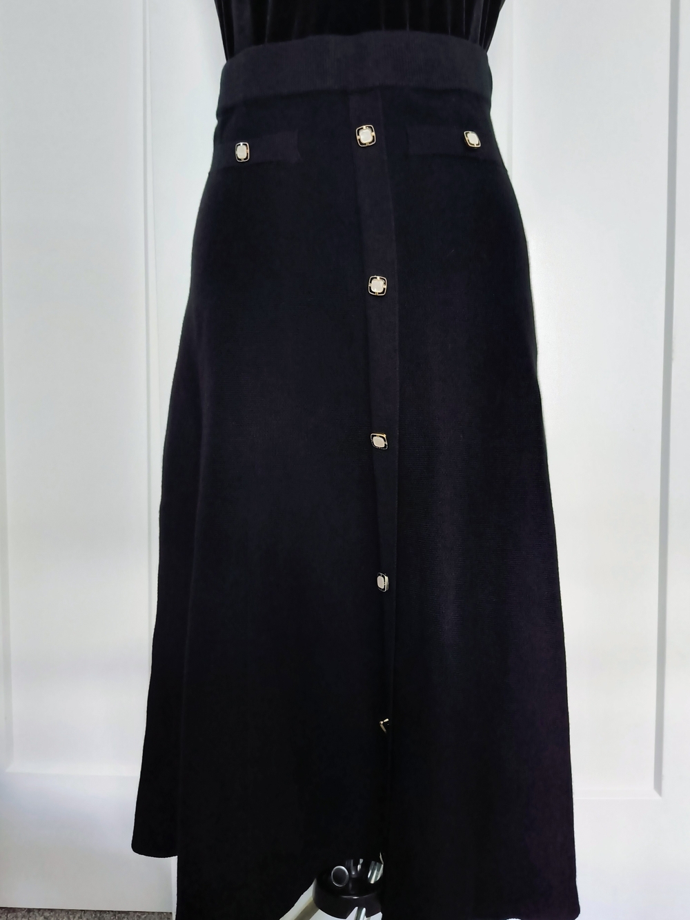 Elegant Black Knit Ankle Length Skirt with Decorative Button Detail
